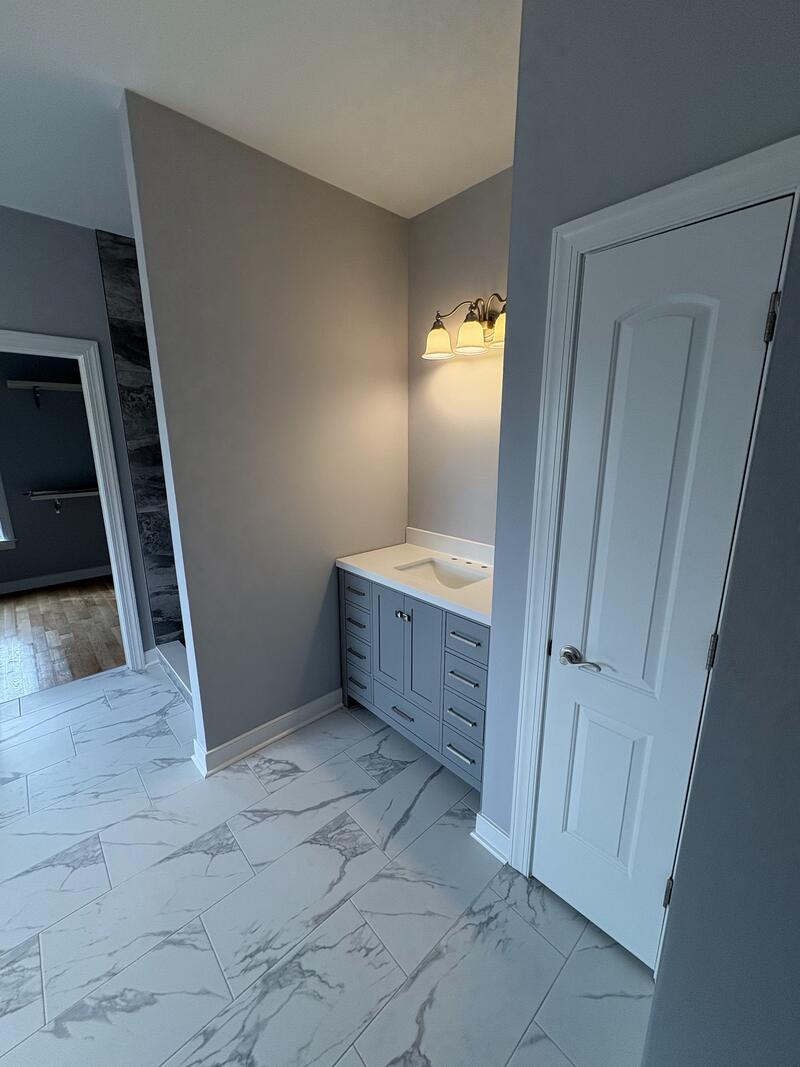 Primary Bathroom Renovation — Flooring, Vanity, and Painting — J. Severt Contracting